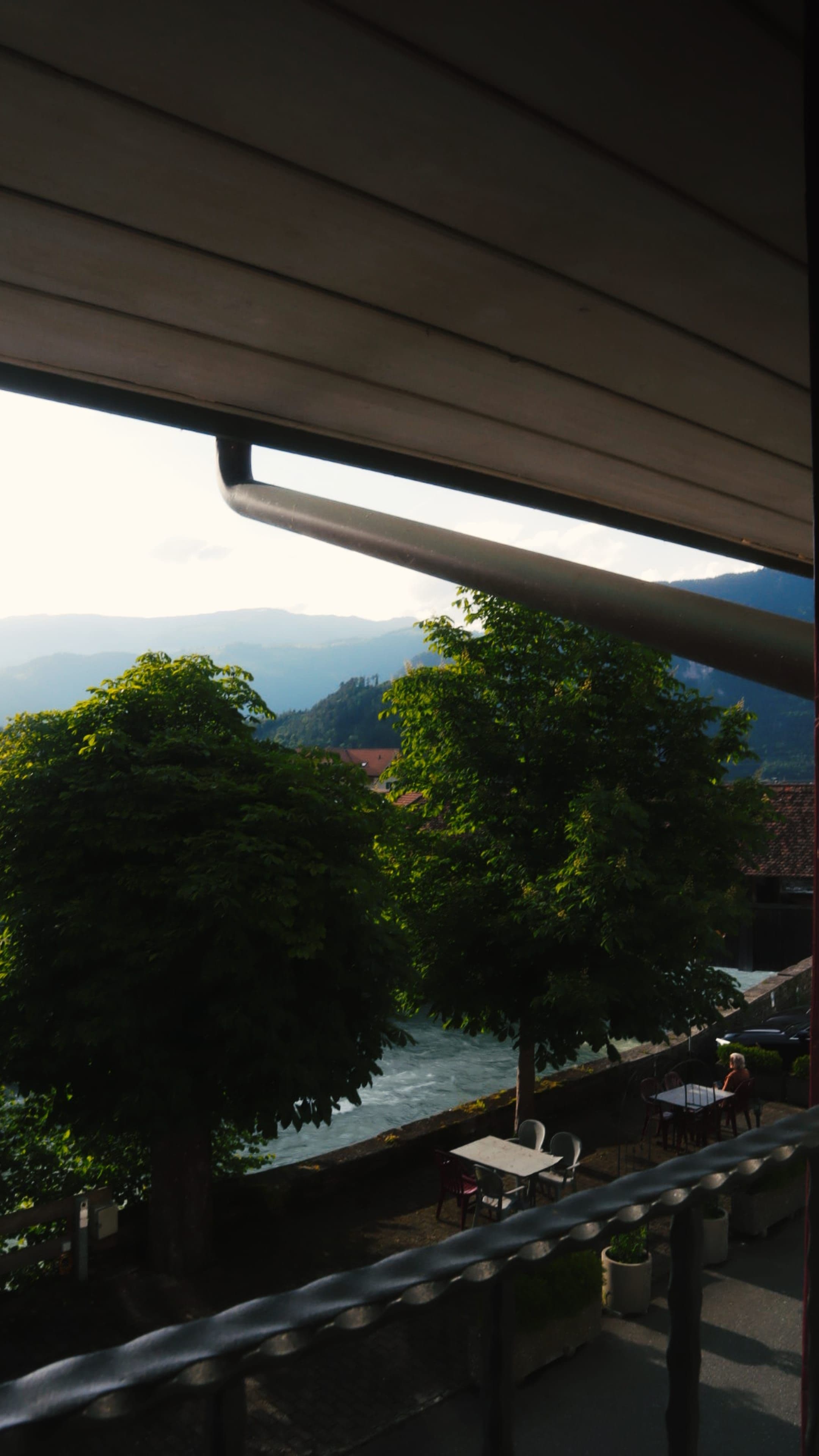 Woman looking out at Swiss landscape